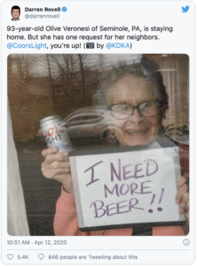 Grandma holding Coors Light and I Need More Beer sign