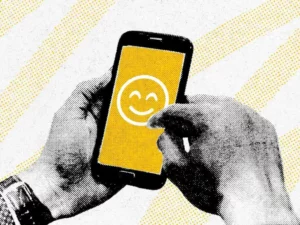 Image showing a mobile device with a happy face, suggesting a happy customer.