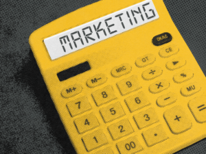 A decorative image of a calculator representing the benefits of treating marketing as an operating expense.